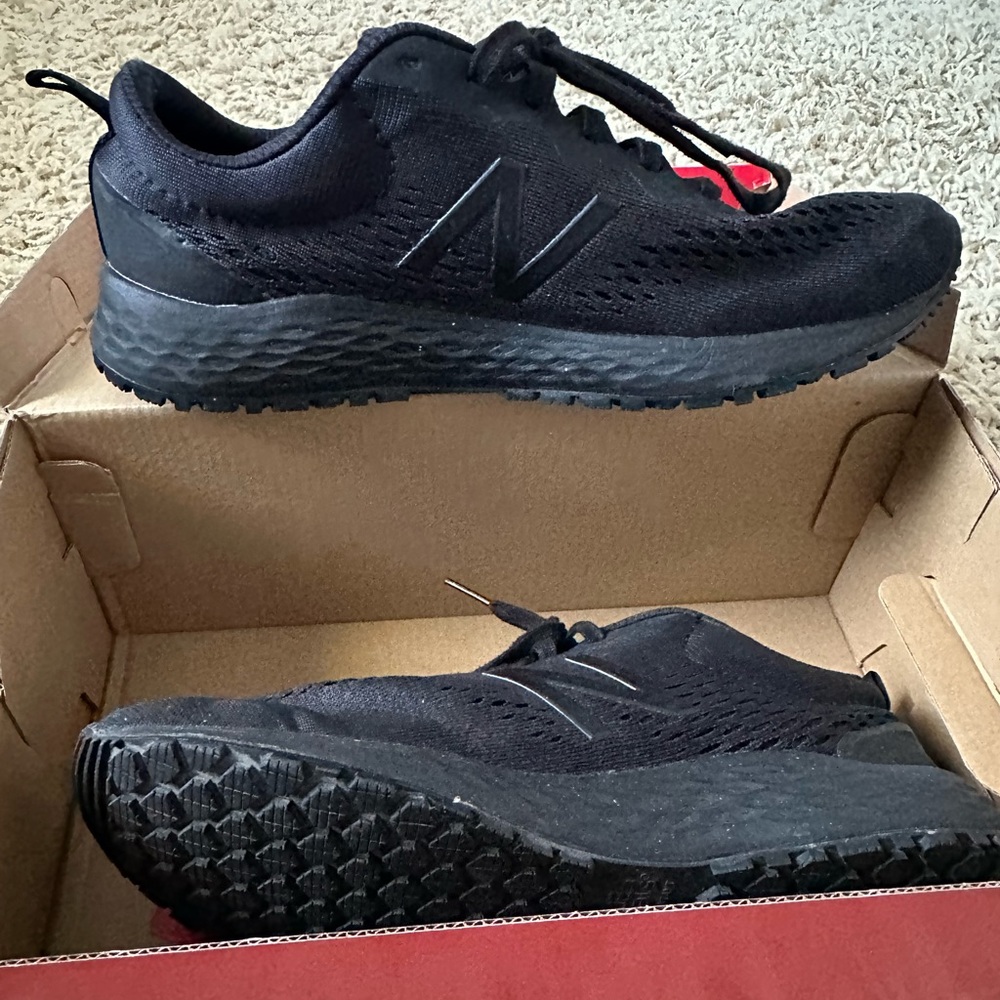 Work shoes by New Balance, slip resistant.